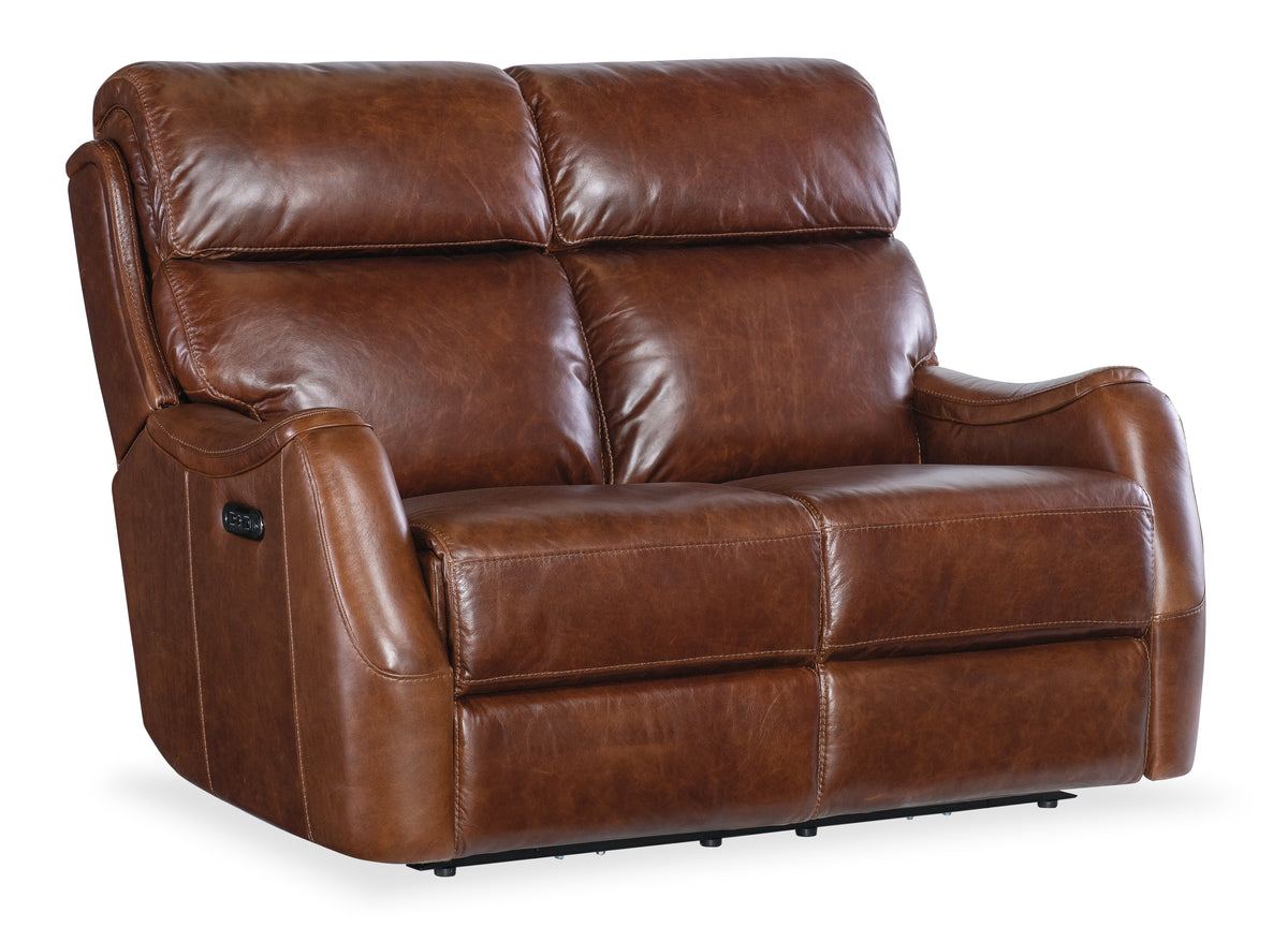 a brown leather couch with a white background