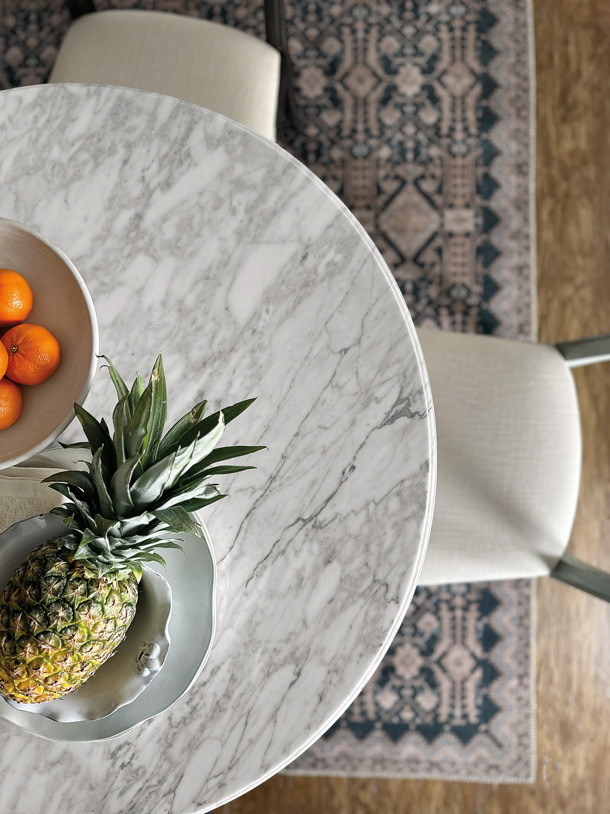 a bowl of fruit on a table