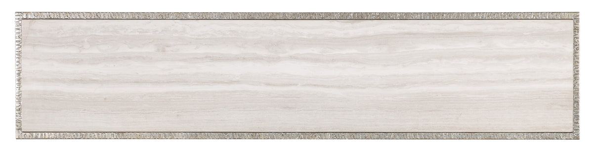 a white rectangular object with a gold border