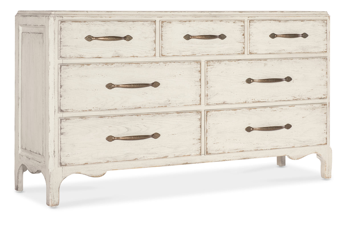 a white dresser with drawers