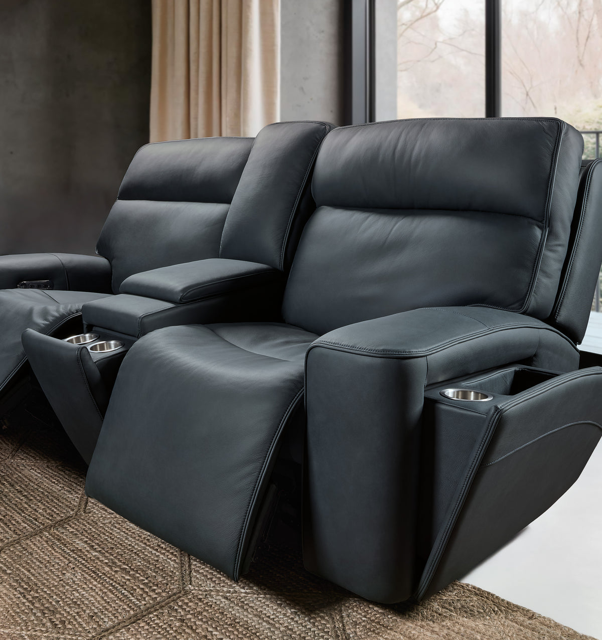 a black recliner in a room