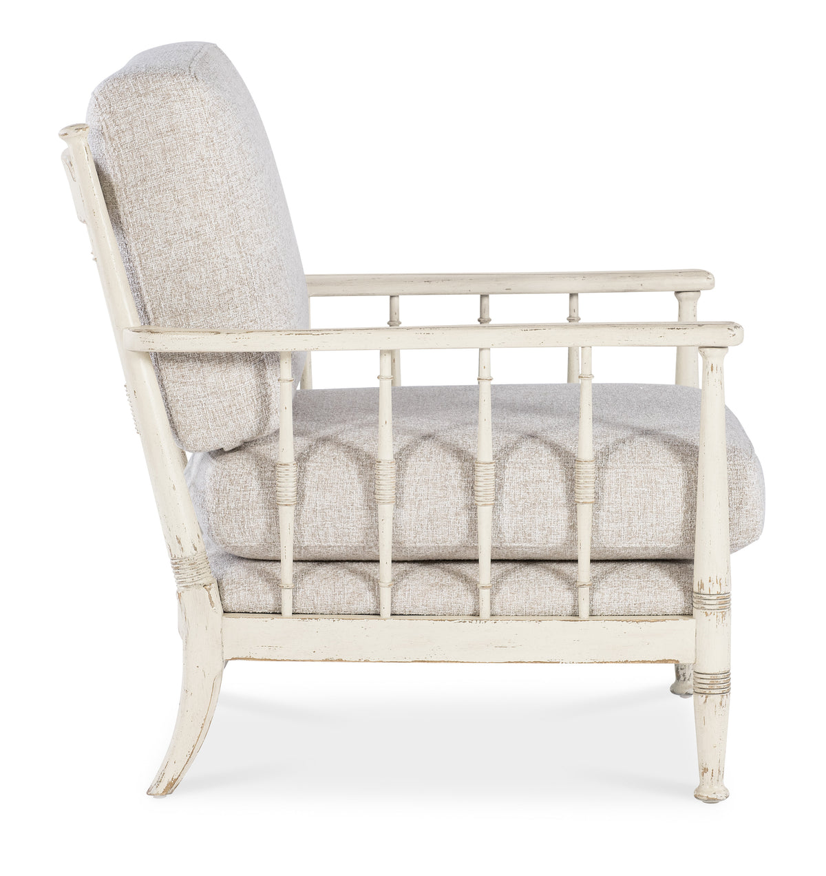 a white chair with a white cushion