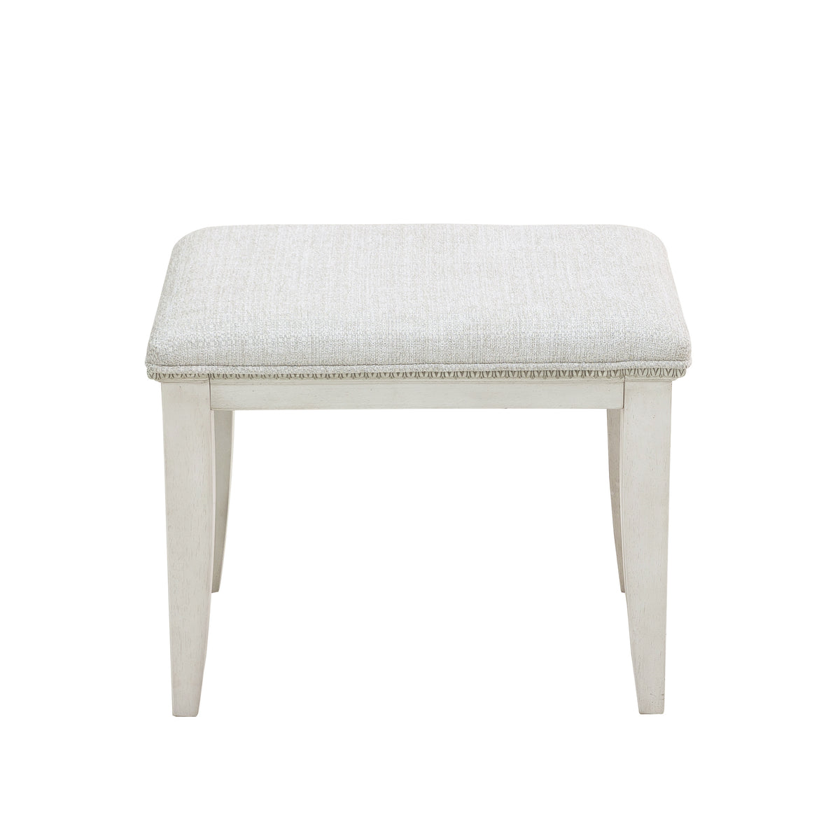 a white stool with a cushion