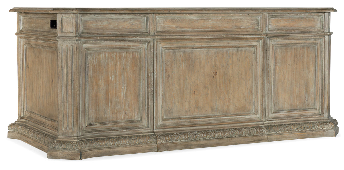 a wooden cabinet with carved designs