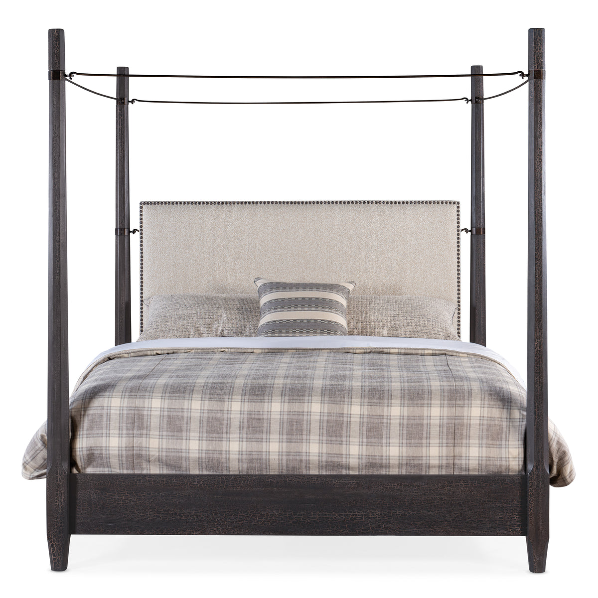 a bed with a four poster bed