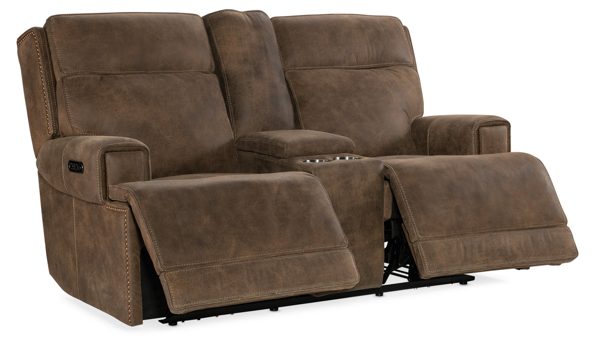 a brown reclining couch with armrests