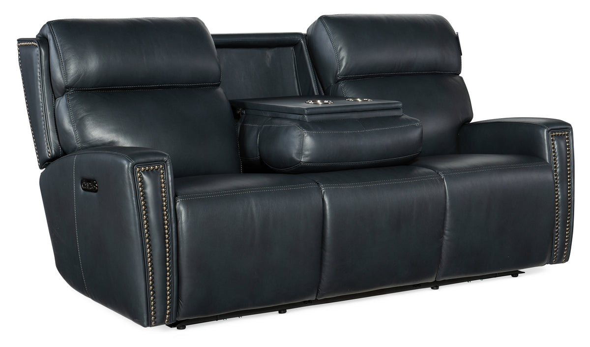 a black leather couch with a small table