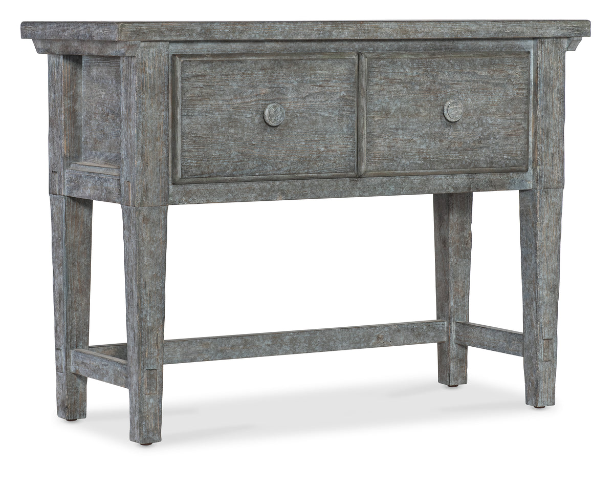 a wooden table with drawers