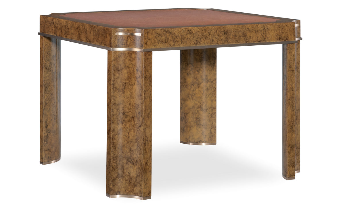 a brown table with a gold band around the top
