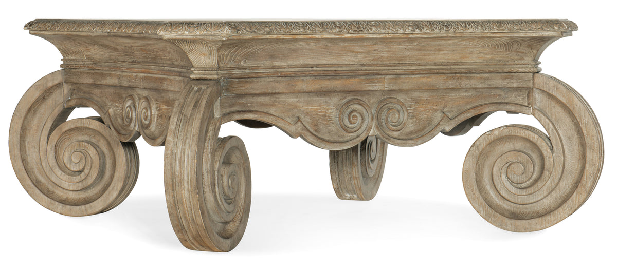 a wooden table with swirls