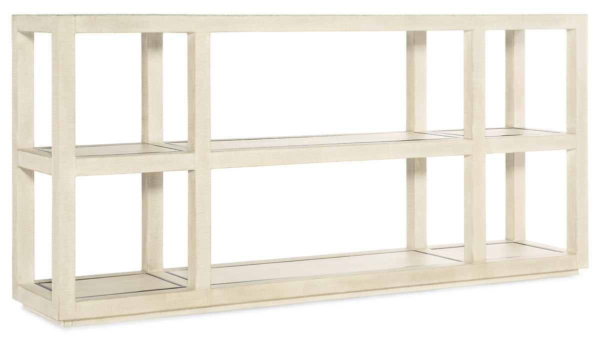 a white shelf with shelves