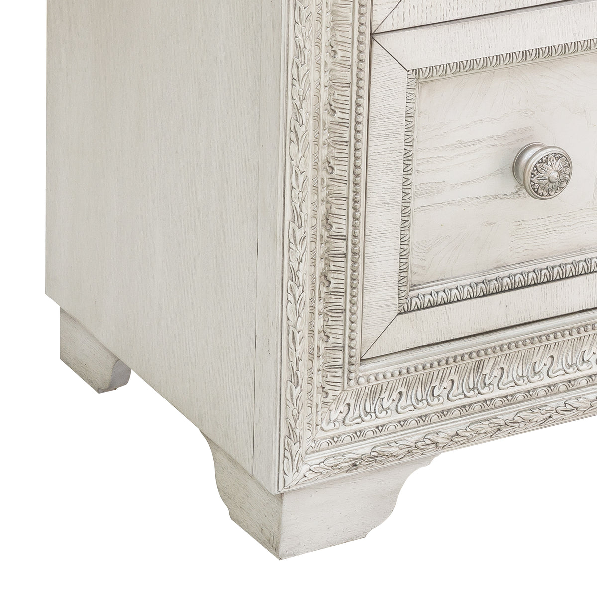 a close up of a white dresser