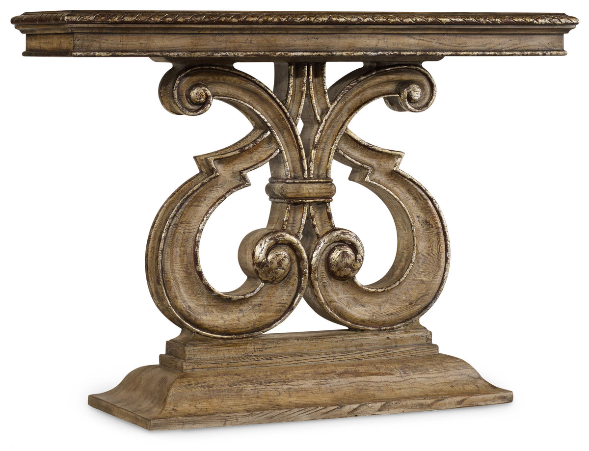 a wooden table with a carved design