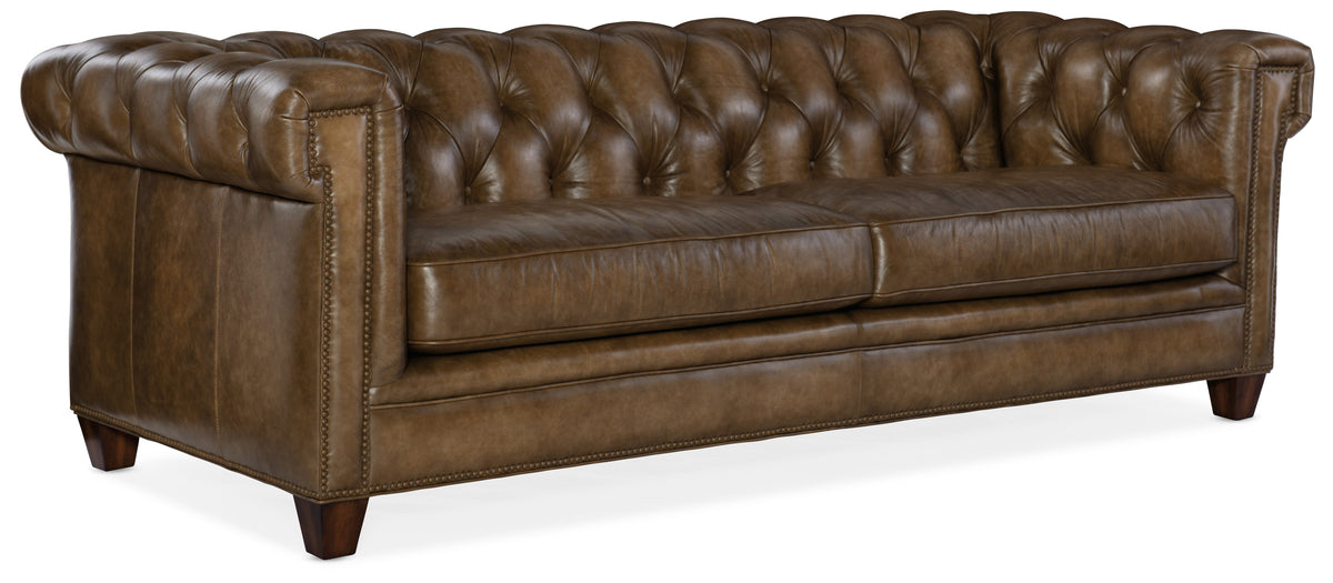 a brown leather couch with white background