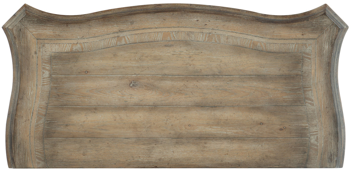 a wood sign with a curved top