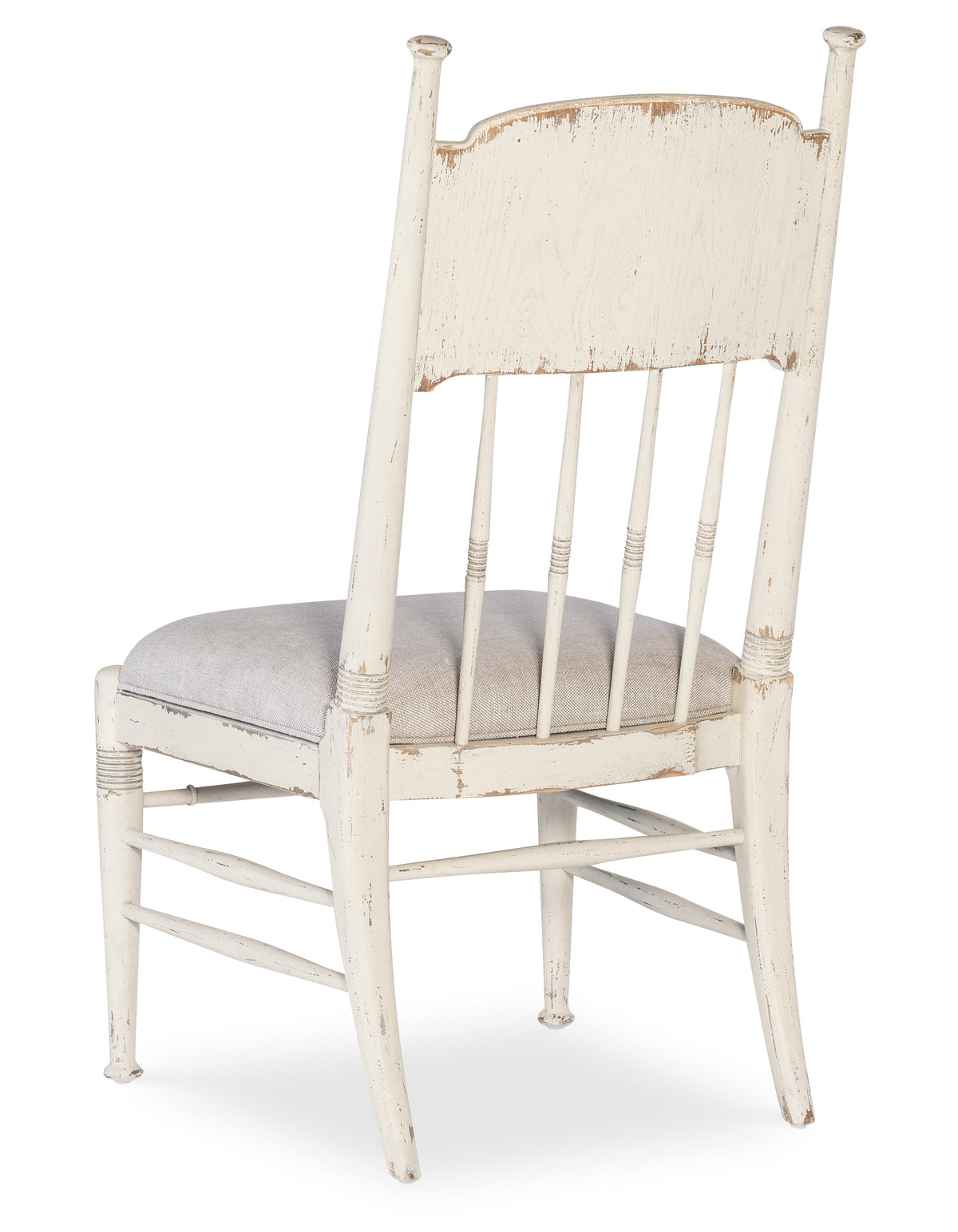 a white chair with a cushion
