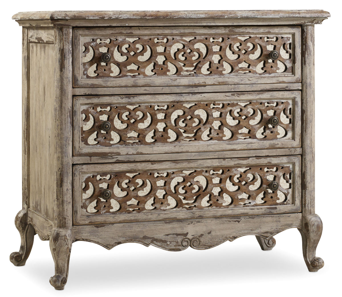 a wooden dresser with a carved pattern