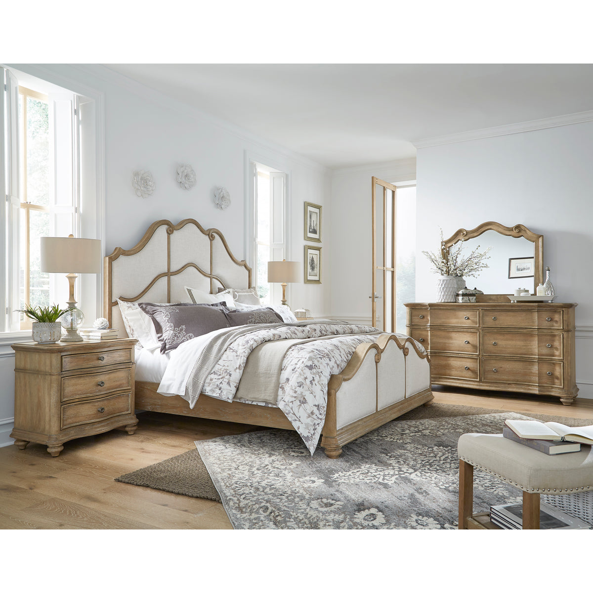 a bedroom with a bed and dresser
