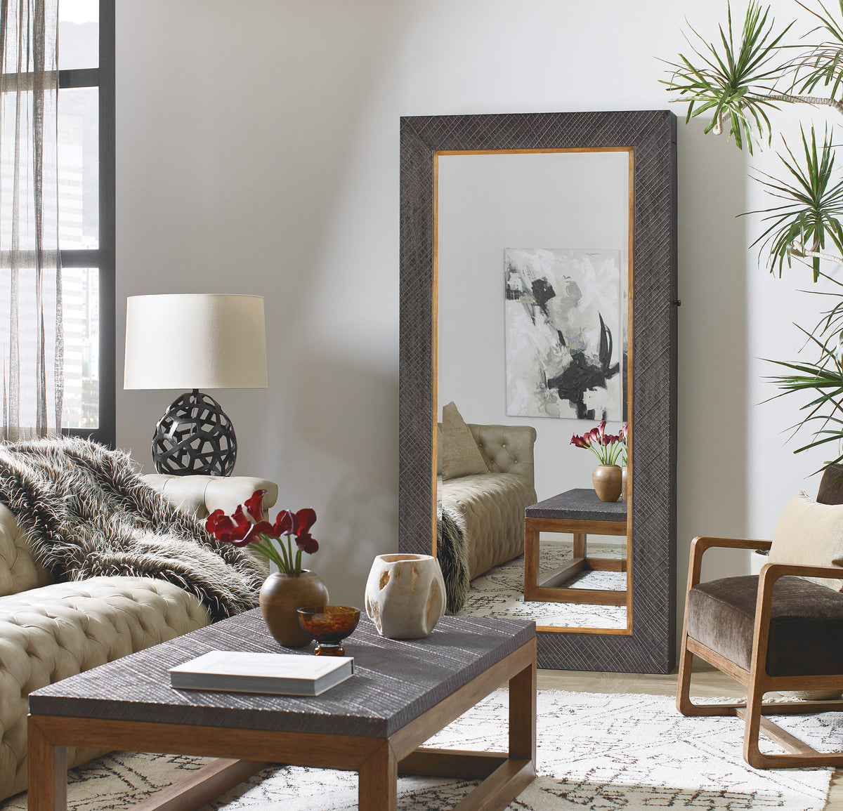 a living room with a large mirror