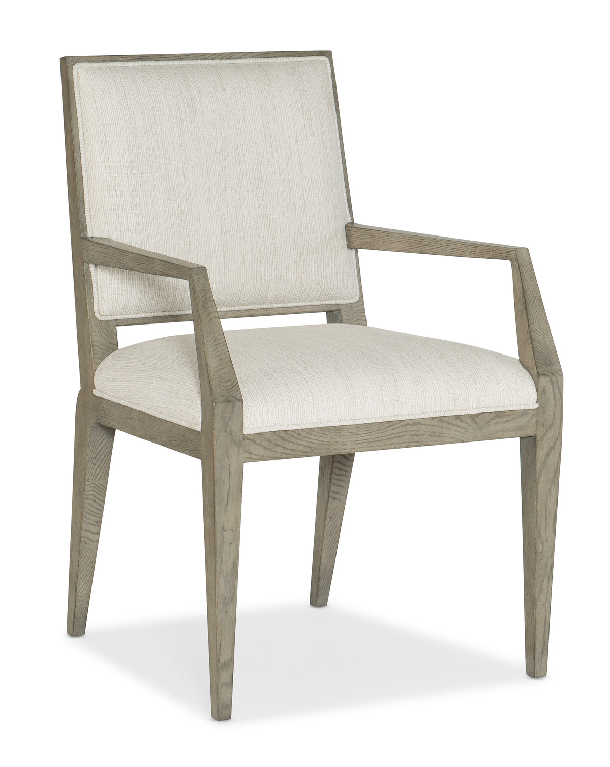 a white chair with a white cushion