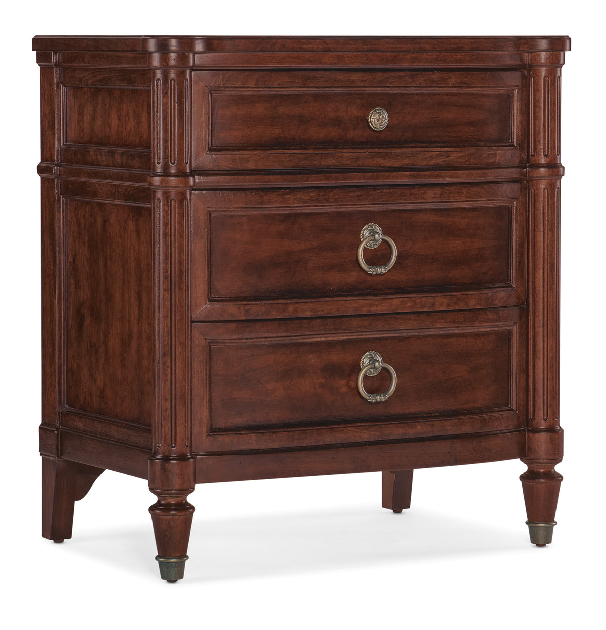 a brown chest of drawers