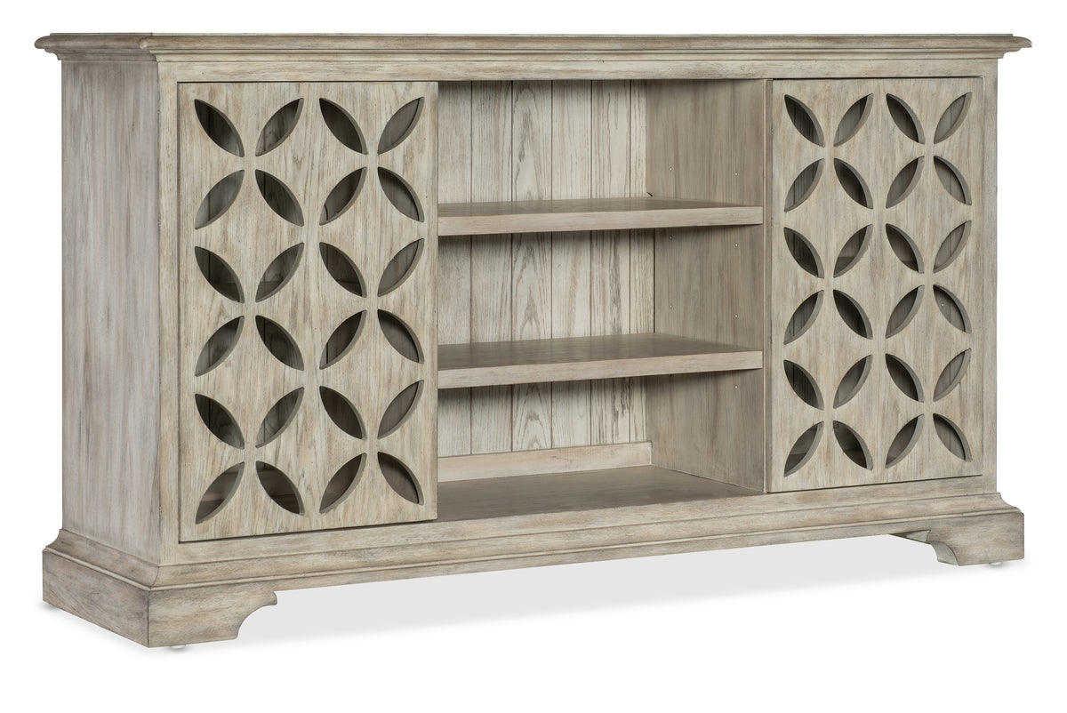 a white wooden cabinet with a design on it
