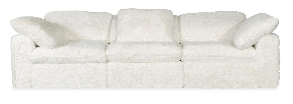 a white couch with pillows