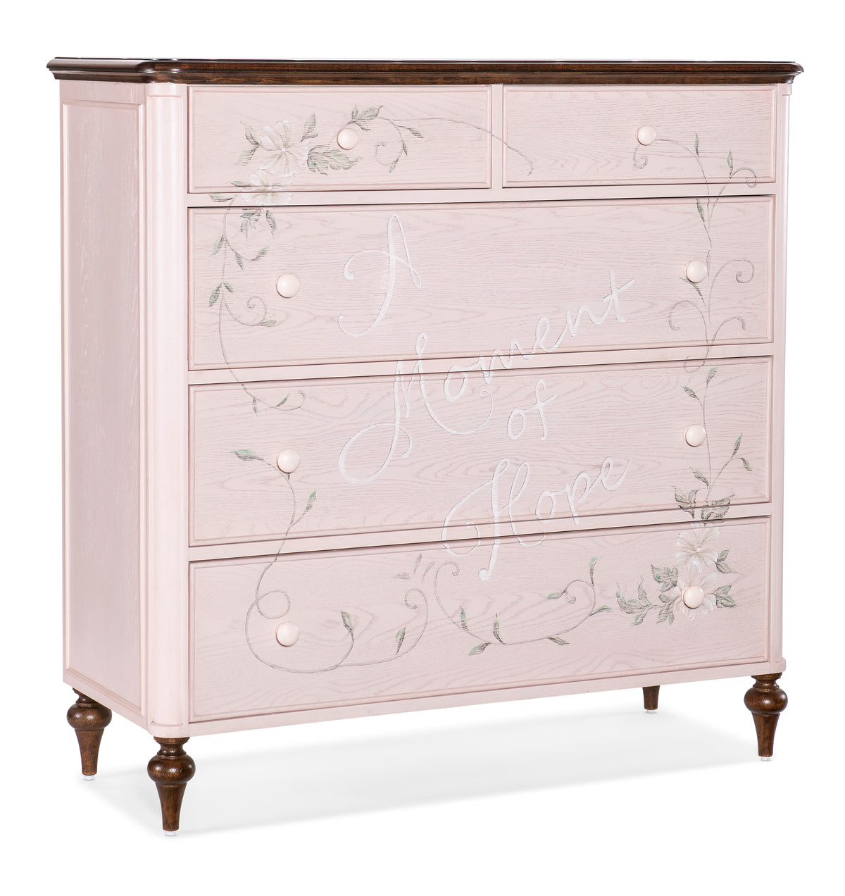 a pink dresser with writing on it