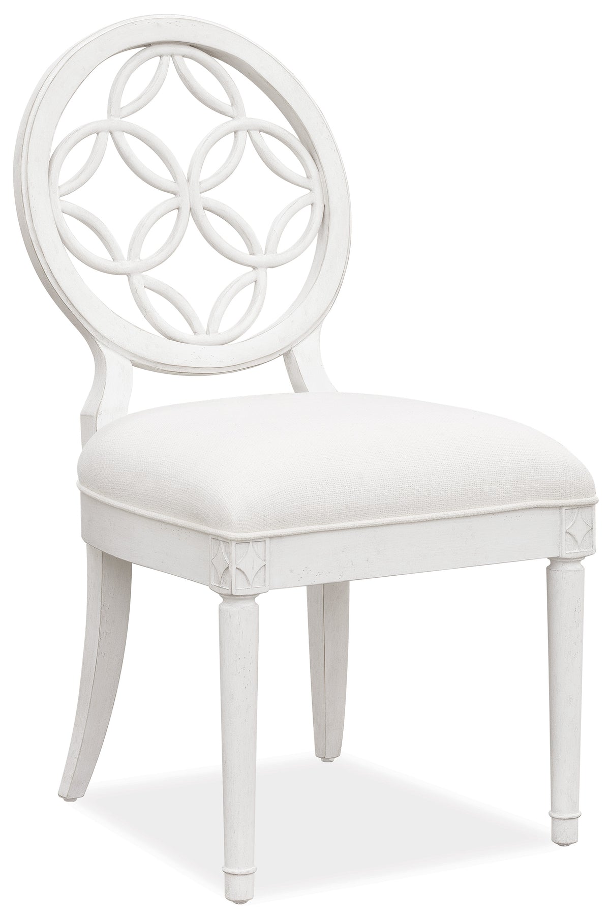 a white chair with a round back