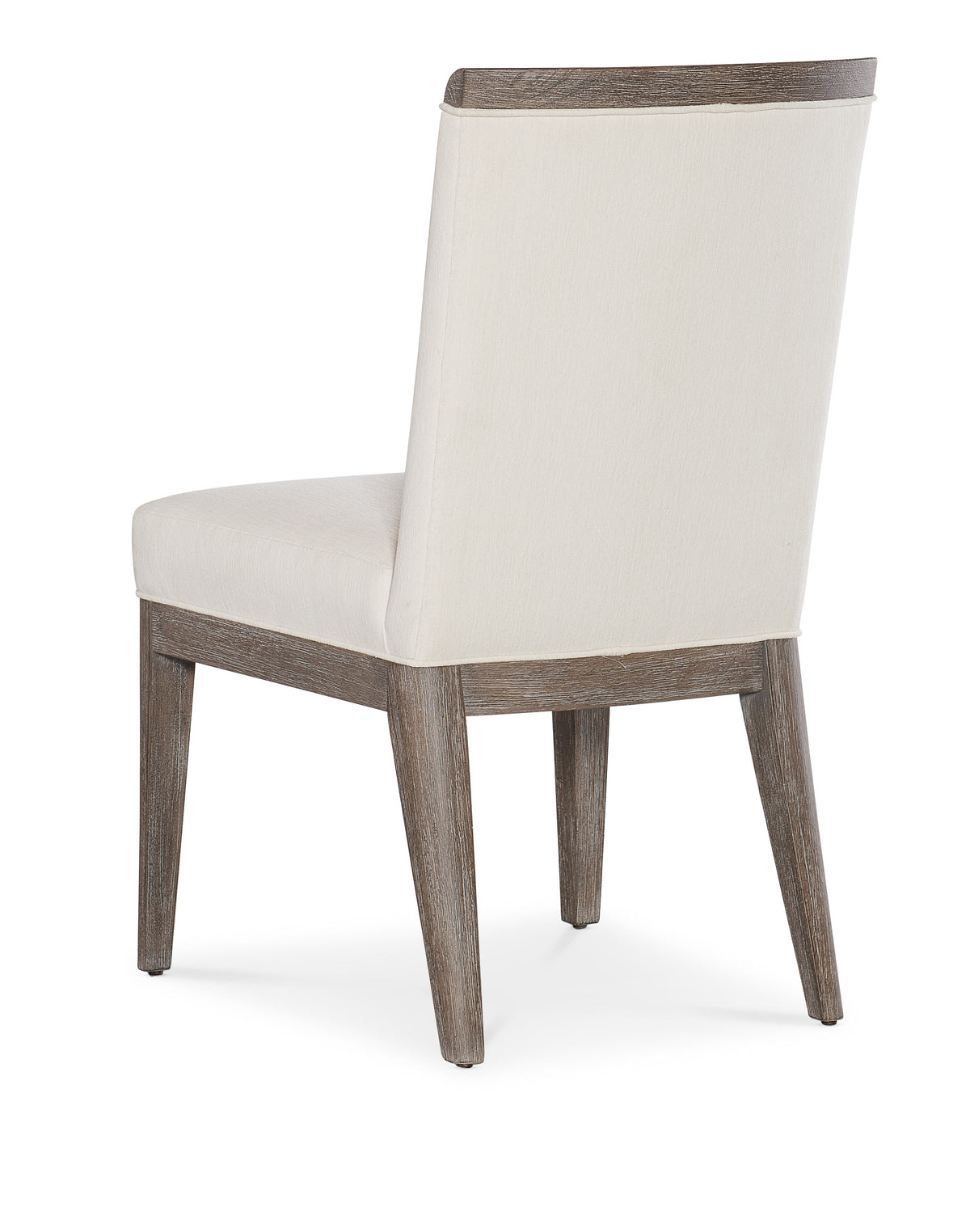 a white chair with wooden legs