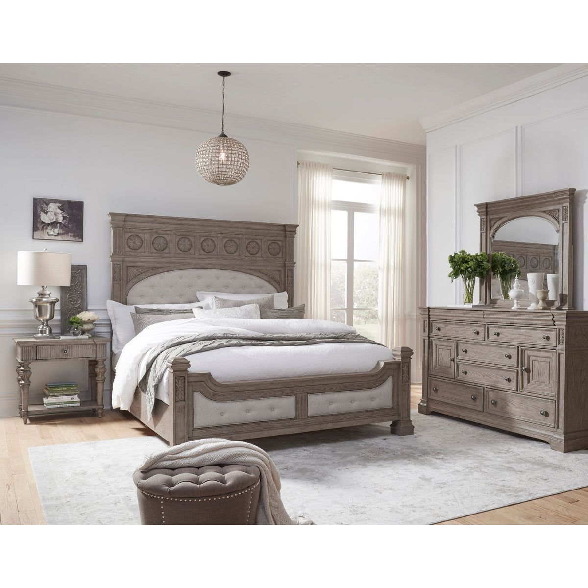 a bedroom with a bed and dresser
