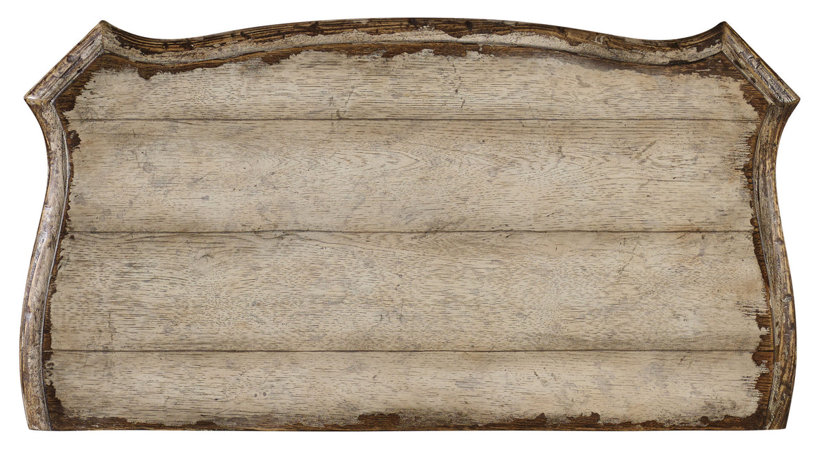 a wooden sign with a curved edge