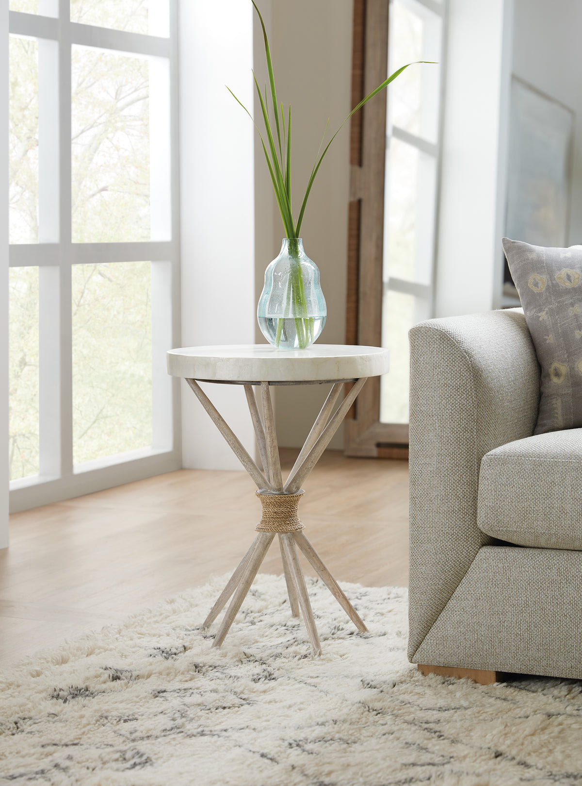 a vase with water on a table