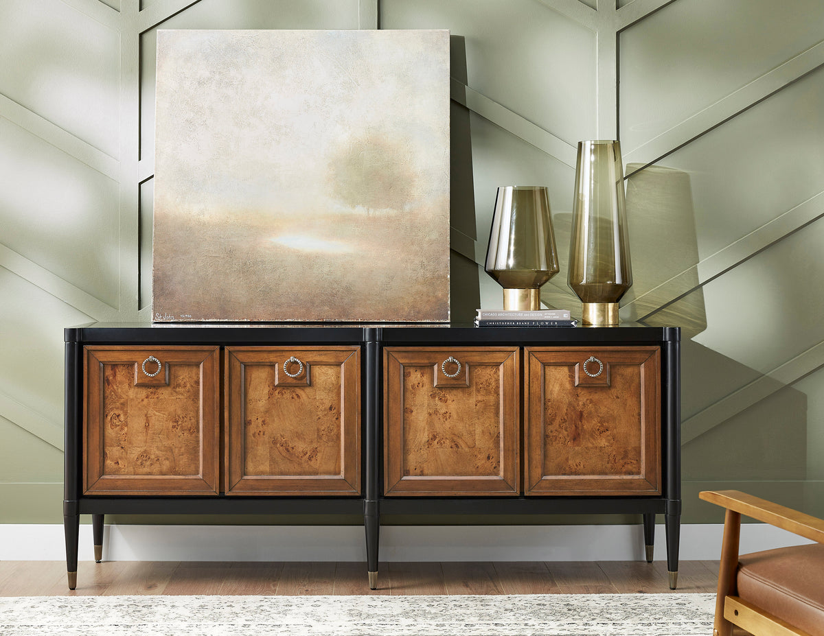 a wood cabinet with a painting on top of it