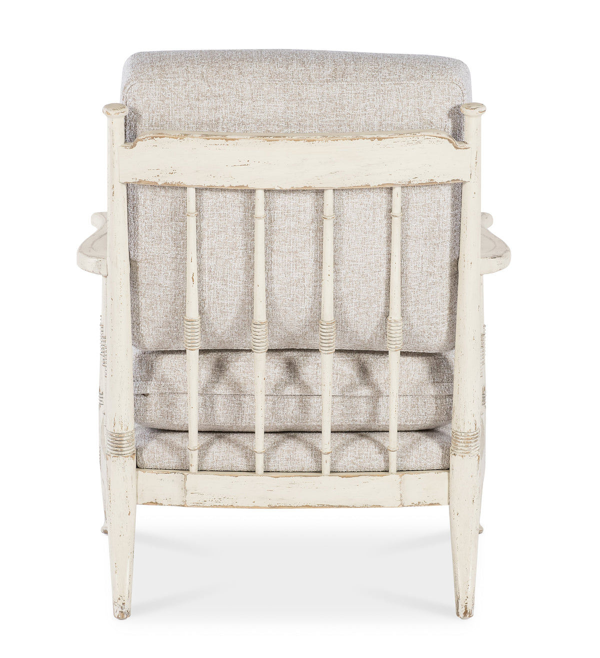 a white chair with a cushion