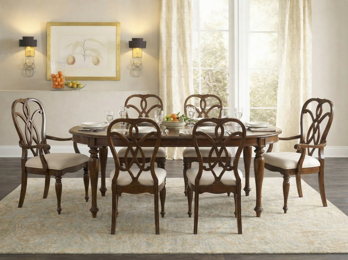 a dining table with chairs in a room