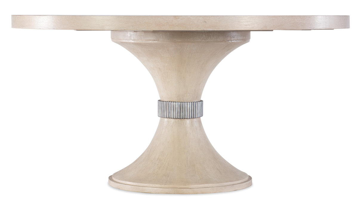 a white round table with a silver band