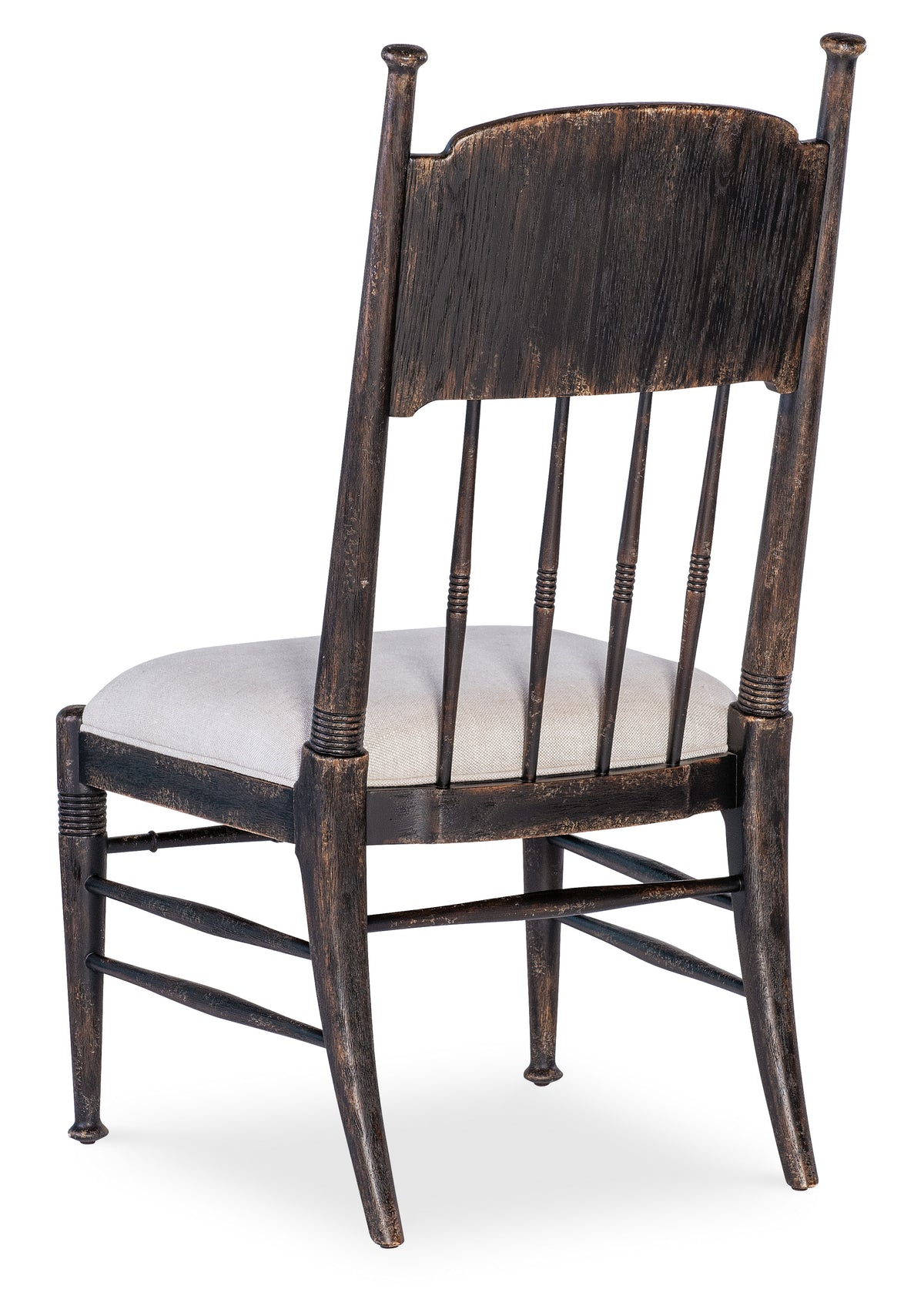 a wooden chair with a white cushion
