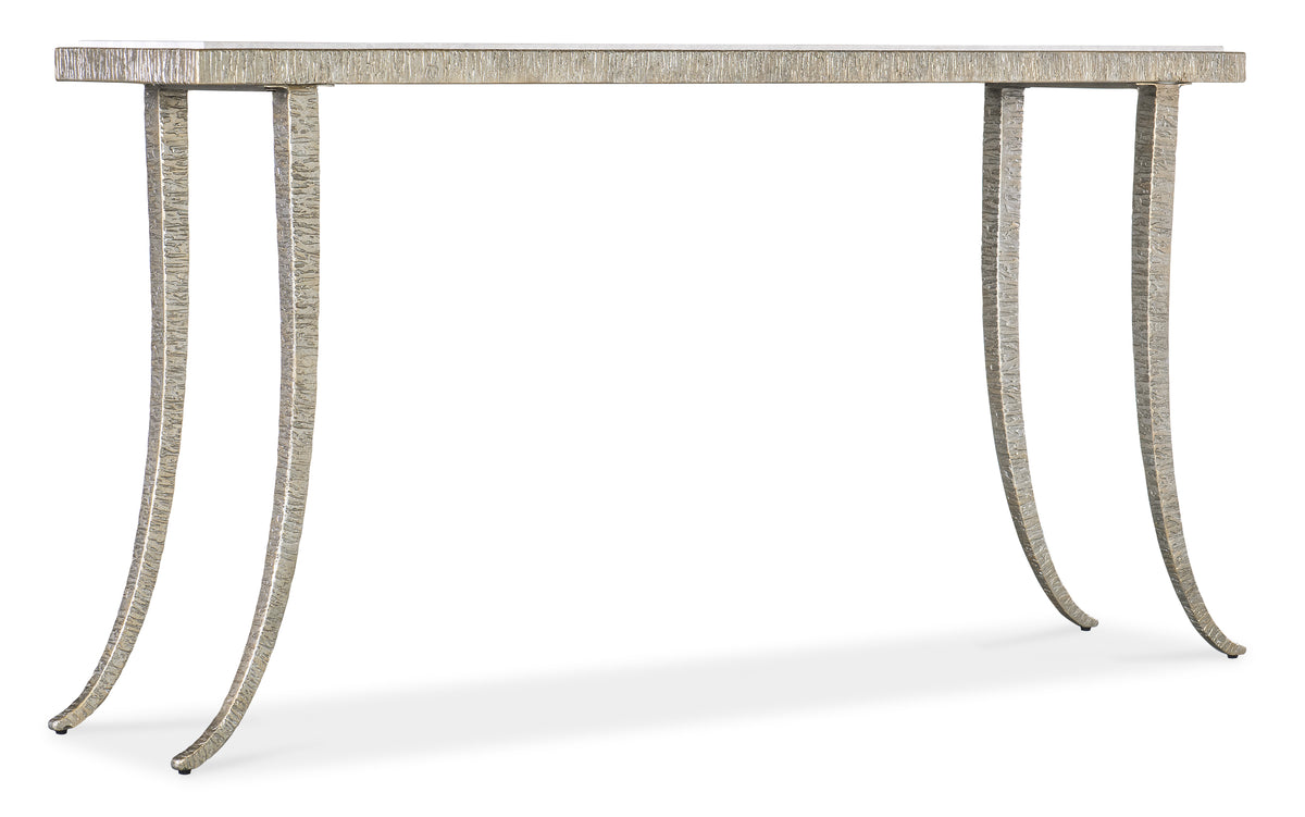 a table with legs and a glass top