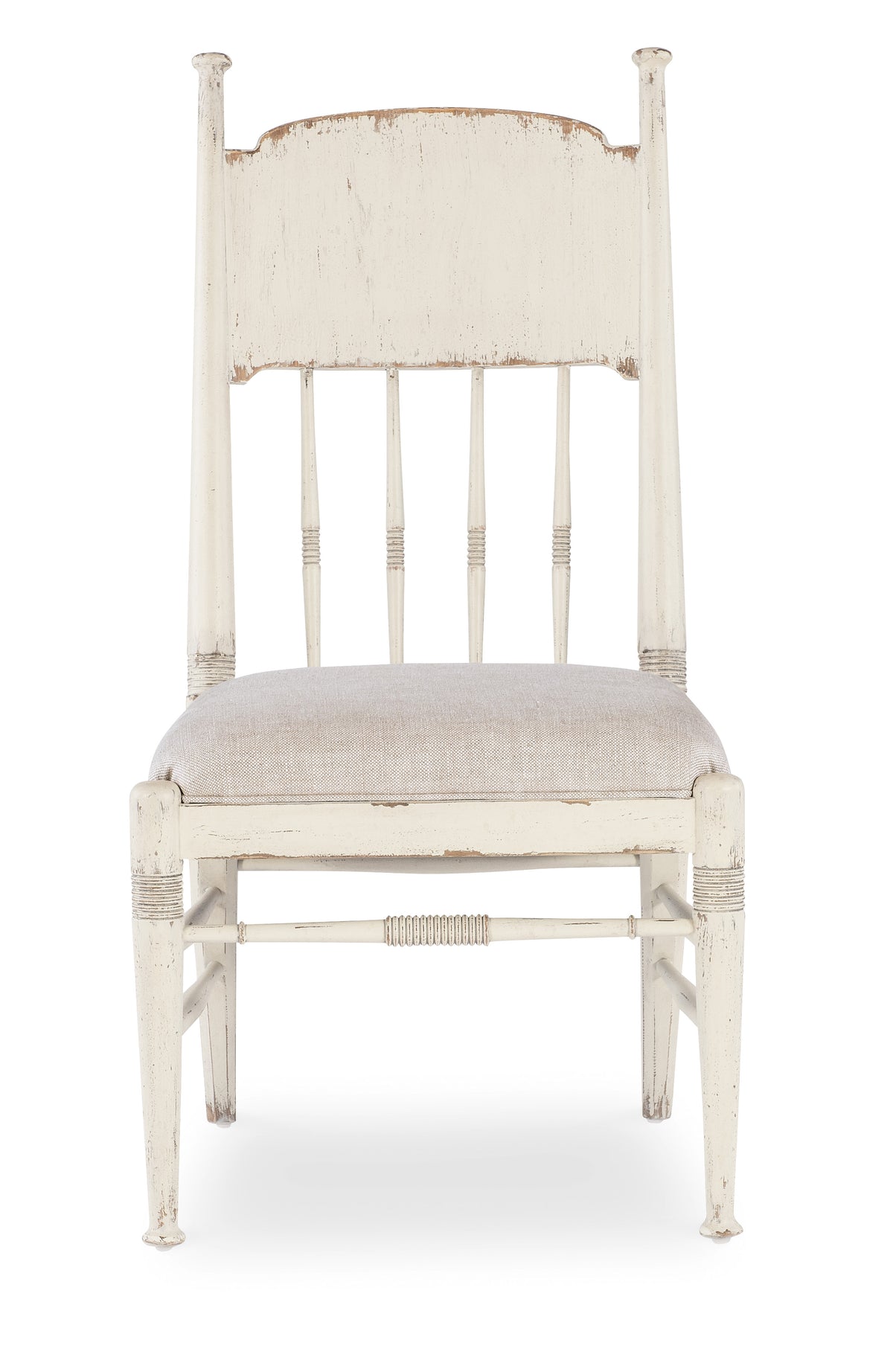 a white chair with a cushion