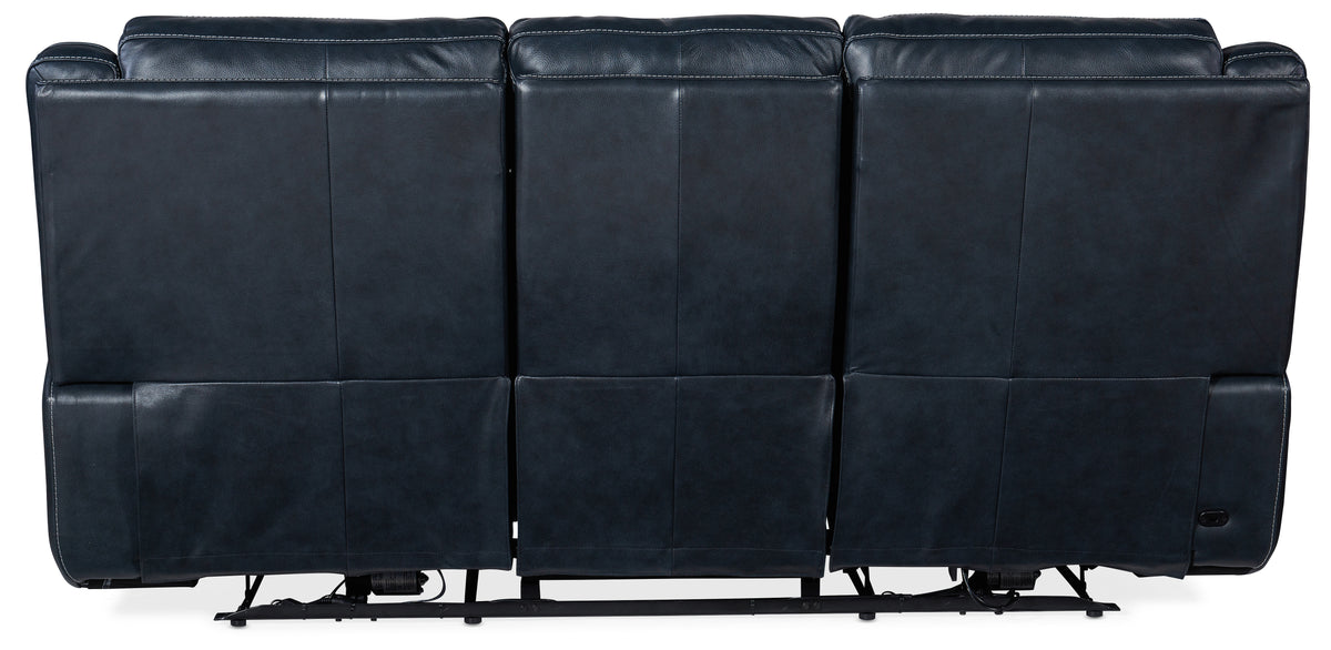 the back of a black leather couch