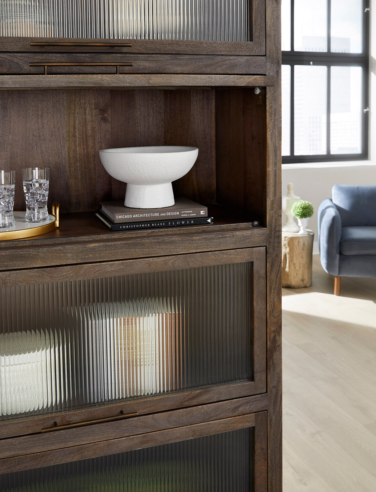 a shelf with a bowl on top