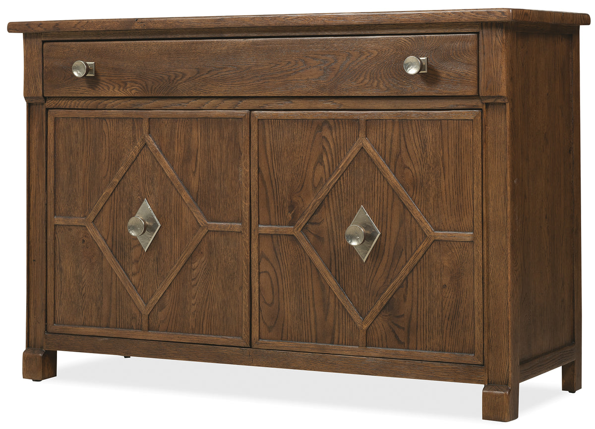 a brown wooden dresser with silver handles