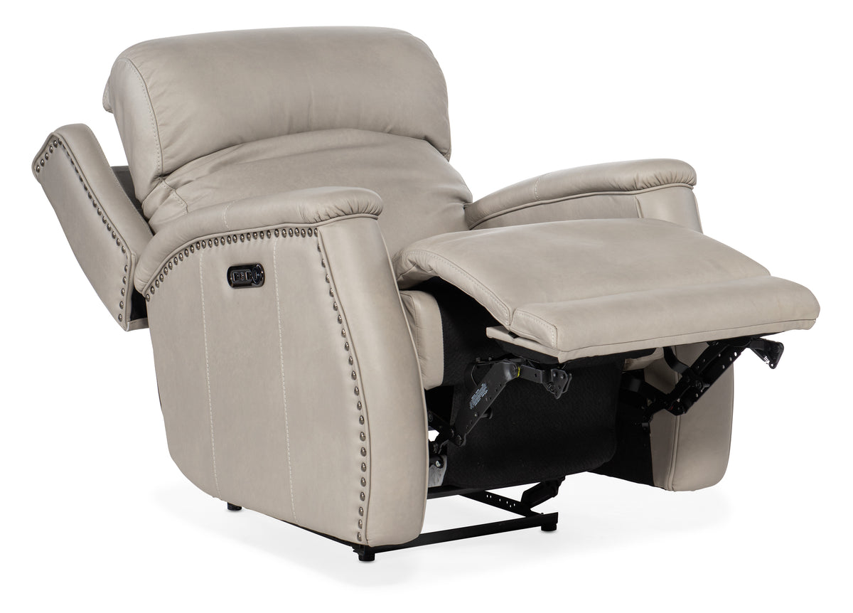 a white recliner with black base