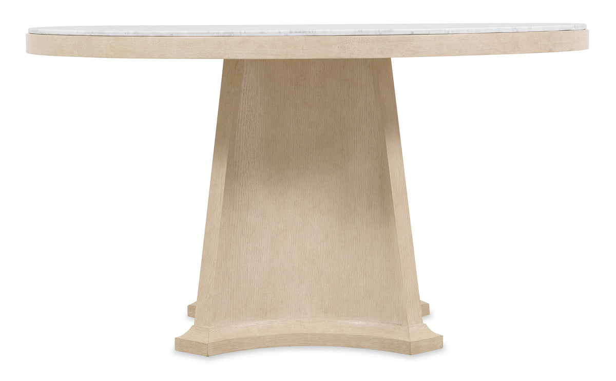 a white table with a marble top