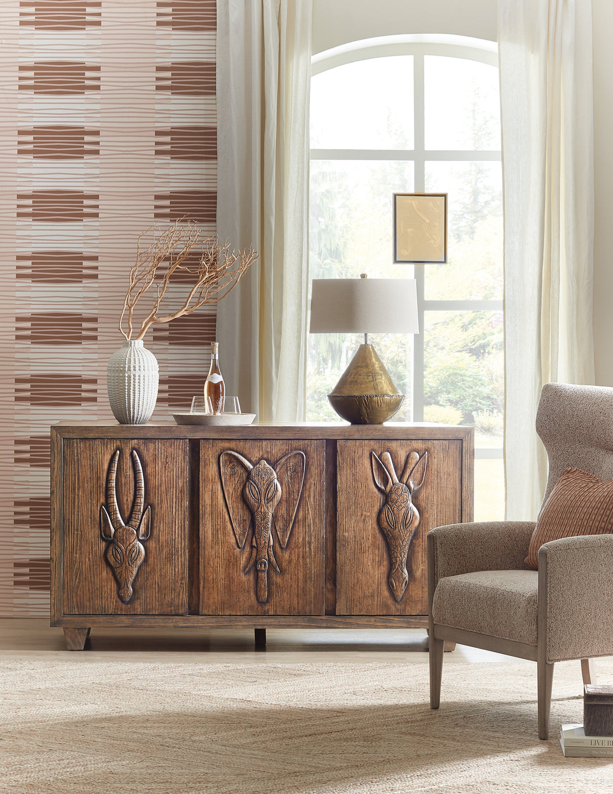 a room with a cabinet and chair