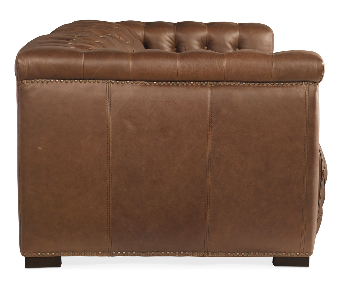 the back of a brown leather couch