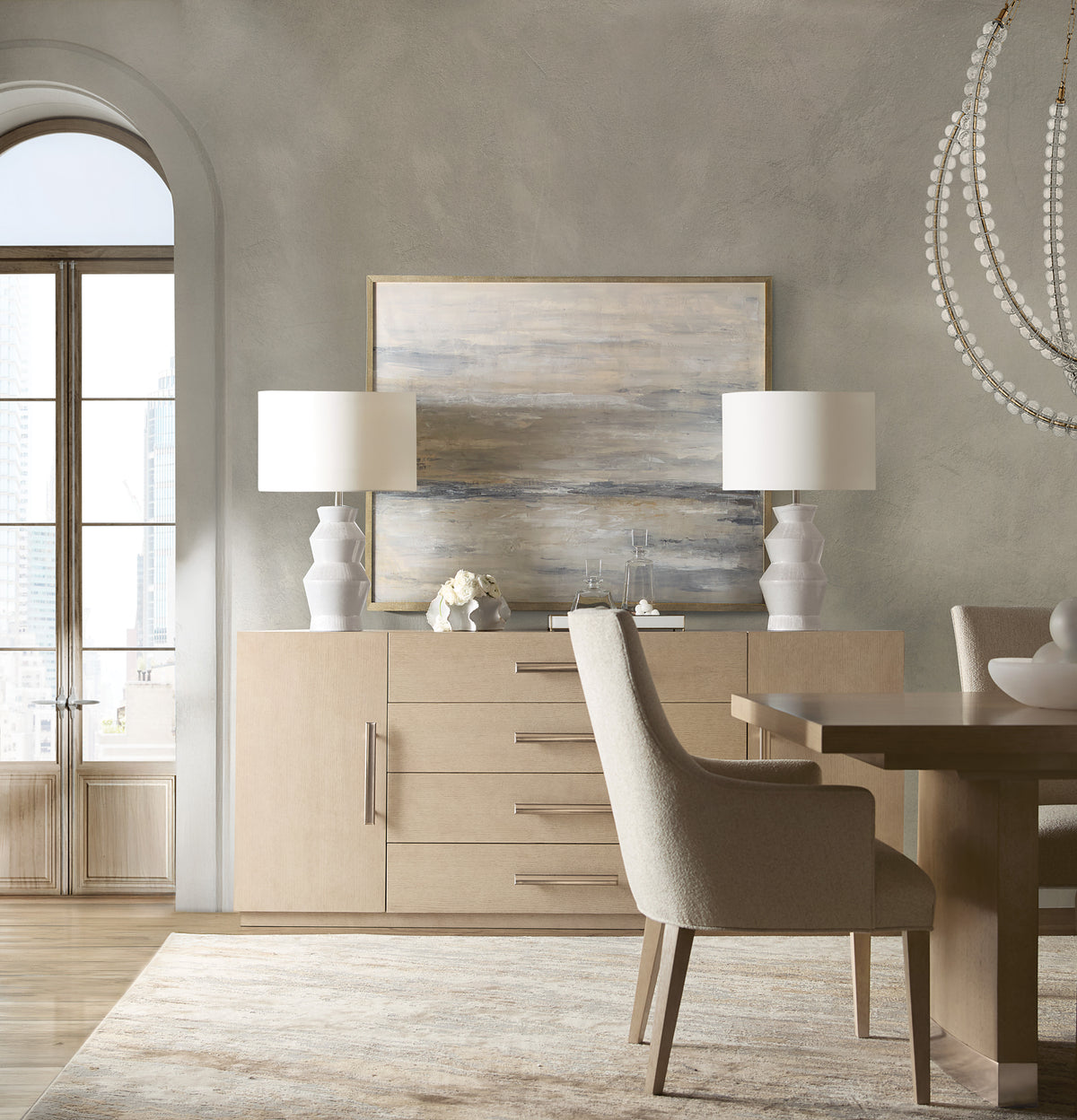 a dining room with a table and chairs