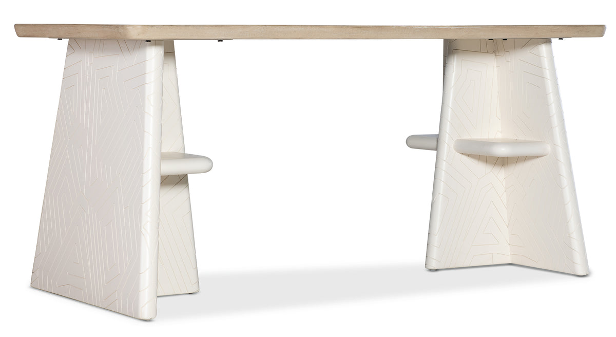 a white table with two chairs
