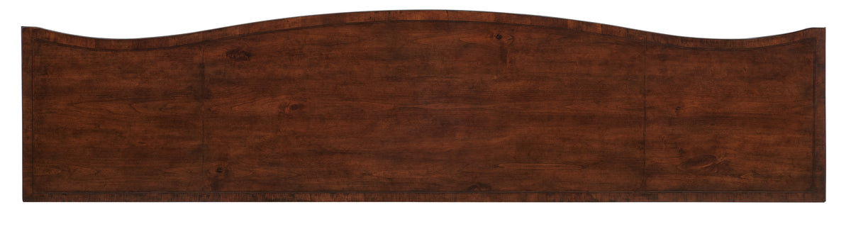 a wooden sign with a curved edge
